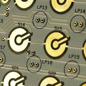 What is the purpose of gold immersion on the surface of printed circuit boards?