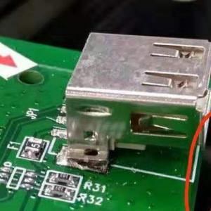 USB warps up after reflow, how to solve it?